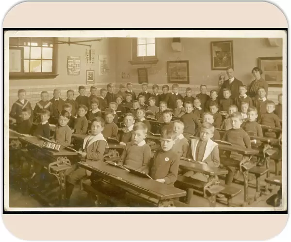 Large classroom of boys with two teachers
