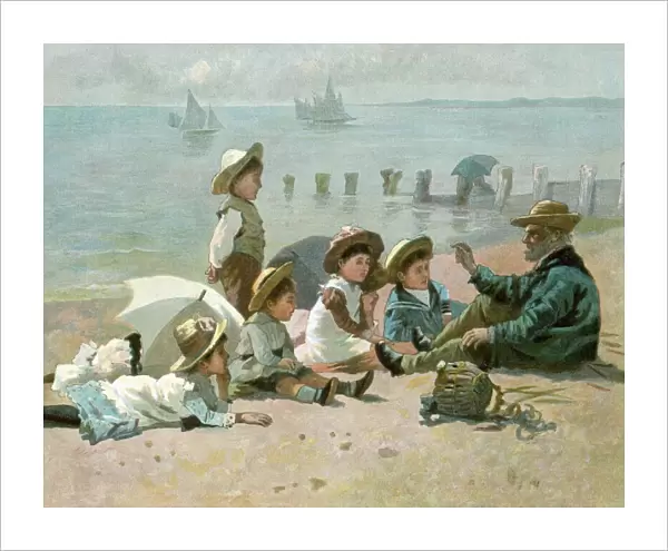Storytelling to children on the beach during the summer