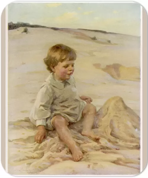 Boy and Sandcastle