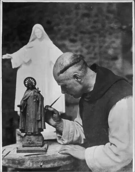 Monk Paints Statuette