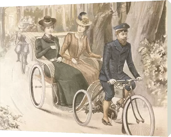 Two women in cycle-drawn carriage
