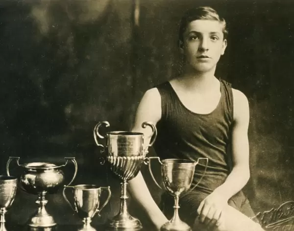 14 year old swimming champion with six trophies