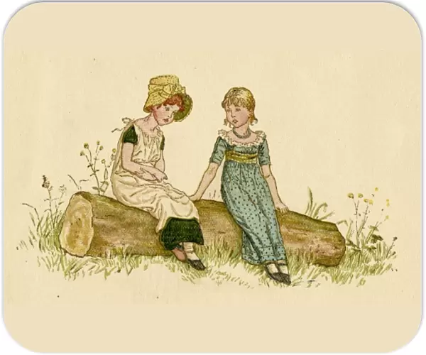 Two little girls sitting on a log