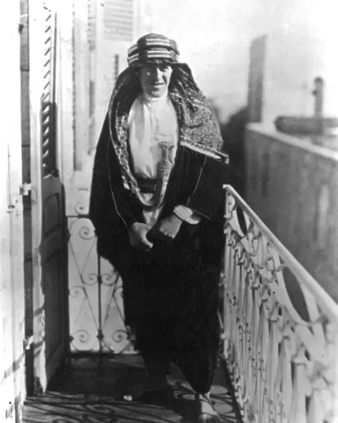 T E Lawrence (Lawrence of Arabia) on a balcony