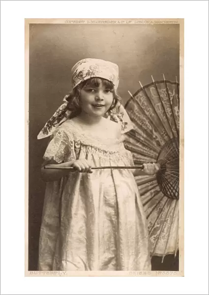 Smiling young girl with a parasol