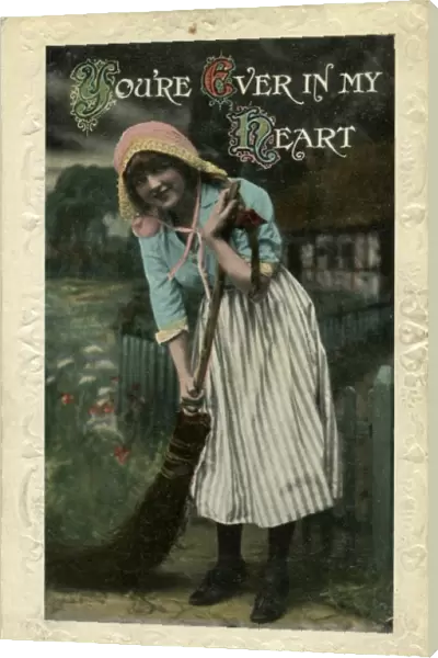 Young woman with sweeping brush