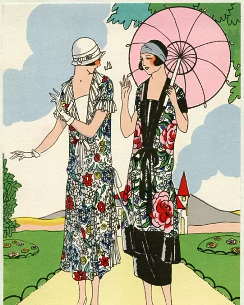 Two young ladies in outfits by Doeuillet
