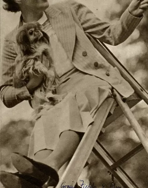 Gracie Fields and her dog Ming