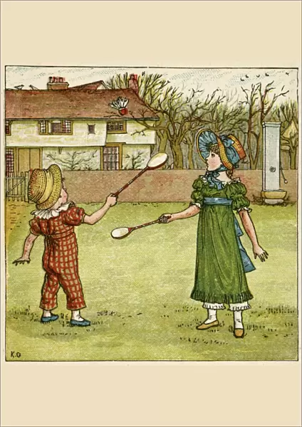 Girl and boy playing shuttlecock and battledore