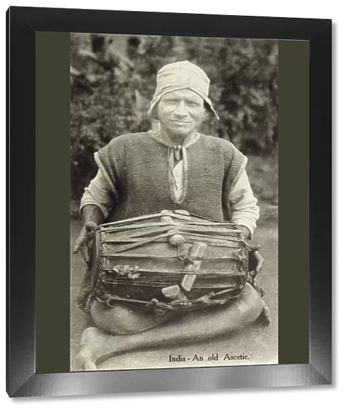Indian man with a Pakhawaj drum