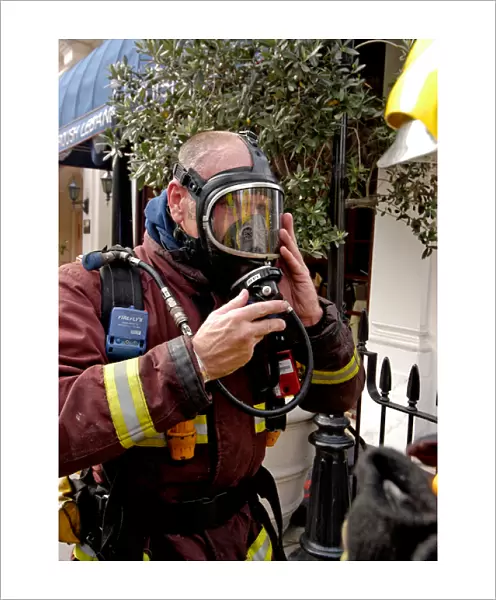 Firefighter wearing breathing apparatus