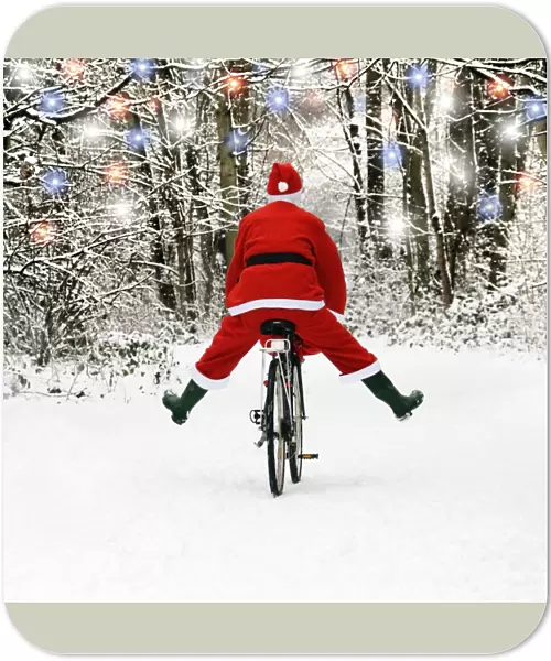 Father Christmas - on a bicycle, freewheeling. Digital Manipulation: extra fur trim, lights, tidied snow