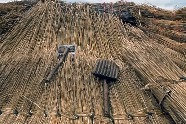 Thatcher's tools- with straw thatching