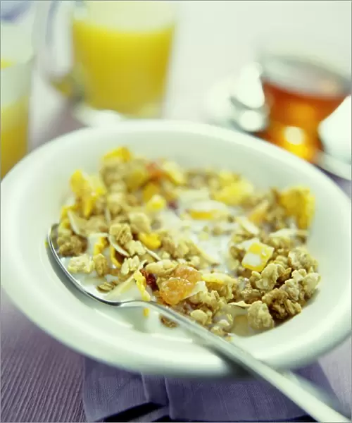 Muesli. This breakfast cereal is a mixture of raw cereal flakes, such as oats, wheat