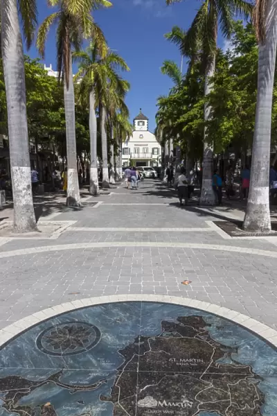 View along palm lined avenue to courthouse with pavement map of the island, Philipsburg, St. Maarten (St. Martin), West Indies, Caribbean, Central America