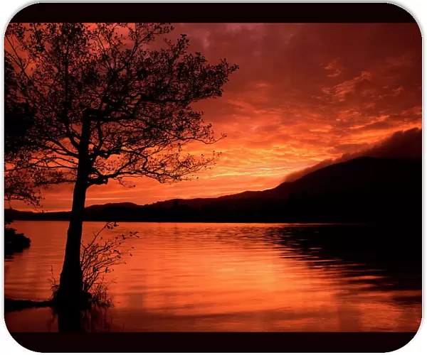 Red sky at sunset, Coniston Water, Consiton, Lake District, Cumbria, England