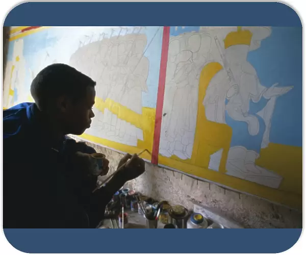Boy working in Aleka Gamid Gidey painting workshop, Zege peninsula, Lake Tana