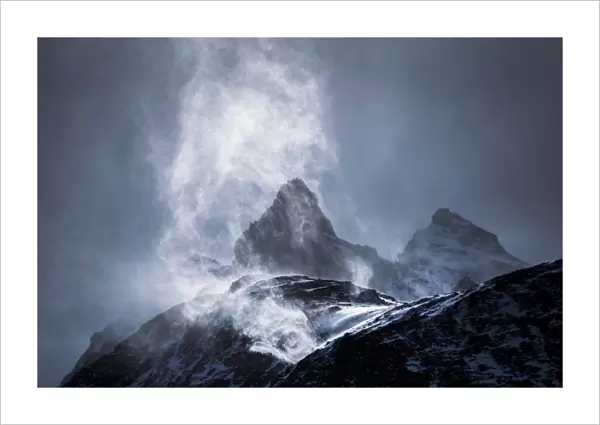 Wind sweeping snow off mountains, Torres del Paine National Park, Patagonia, Chile