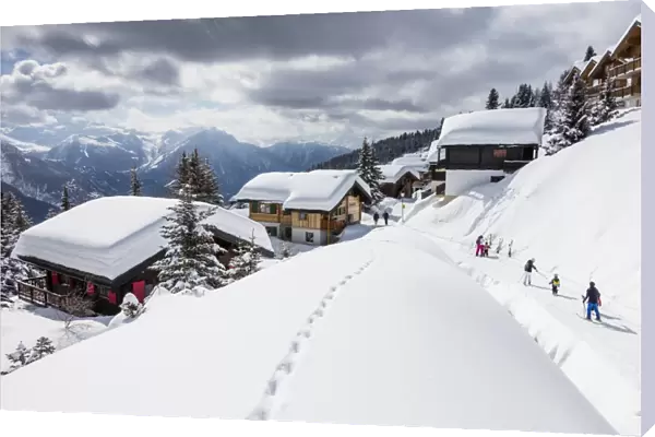 Tourists and skiers enjoying the snowy landscape, Bettmeralp, district of Raron, canton of Valais