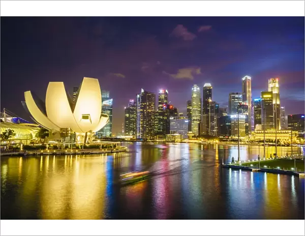 The lotus flower shaped ArtScience Museum overlooking Marina Bay with the city skyline