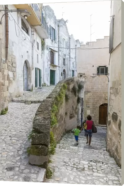 Typical stone alleys in the old town center of Matera also known as the Subterranean City