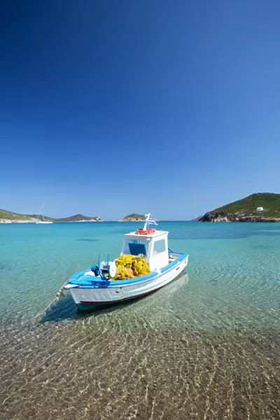 Fishing boat moored on the beach, Patmos Island, Dodecanese, Greek Islands, Greece