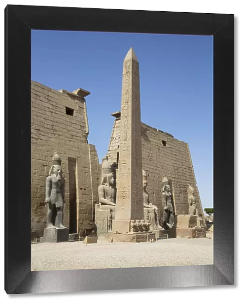 Colossi of Ramses II in front of Pylon, Obelisk, Luxor Temple, UNESCO World Heritage Site