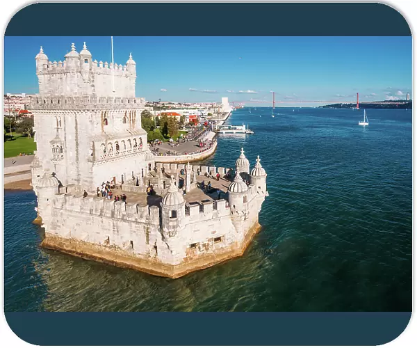 Aerial drone view of Belem Tower, a 16th-century fortification located in Lisbon, Portugal on the Tagus River