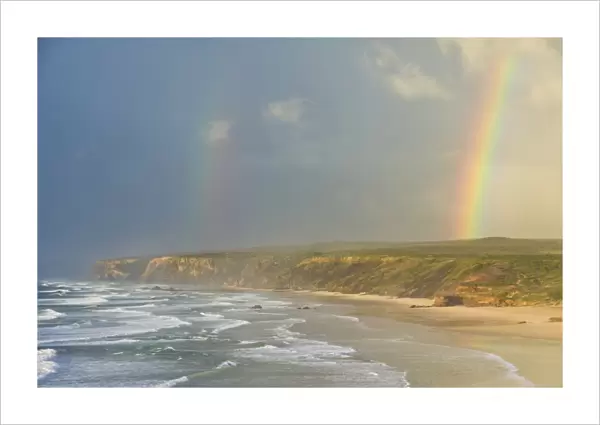 Double rainbow after storm at Carrapateira Bordeira beach, Algarve, Portugal, Europe