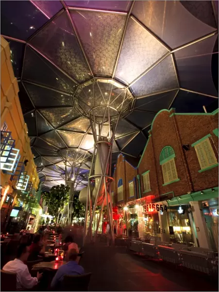 Night time at Clarke Quay with the ceilings colourfully illuminated, Singapore