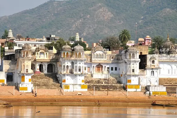 Ghats at Holy Pushkar Lake and old Rajput Palaces, Pushkar, Rajasthan, India, Asia