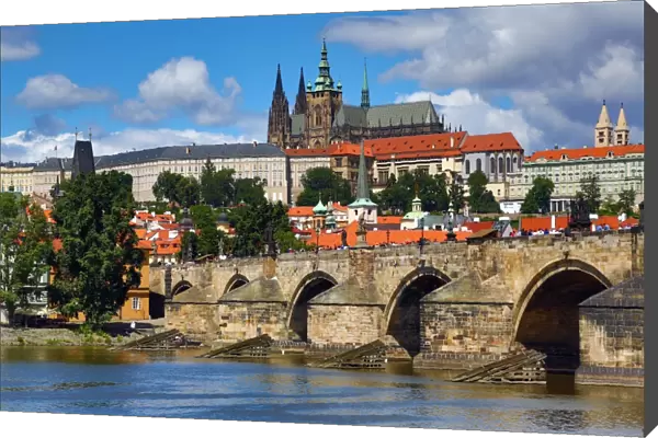 St. Vitus Cathedral and Prague Castle with the Charles Bridge over the Vltava River in Prague
