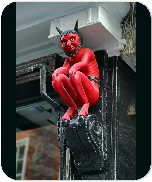 Little Red Devil statue, symbol of a printer, in York, Yorkshire, England