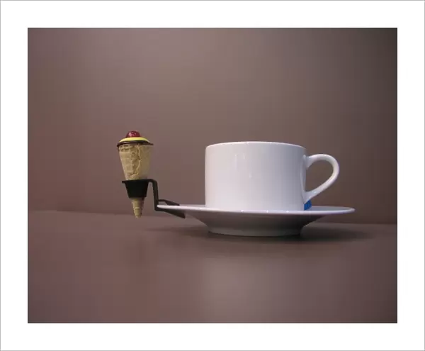 Coffee cup with ice cream cone
