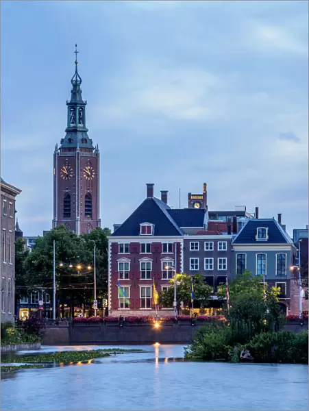 View over Hofvijver towards Grote of Sint-Jacobskerk at twilight, The Hague, South