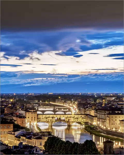 Cityscape with Ponte Vecchio and Arno River at dusk, Florence, Tuscany, Italy