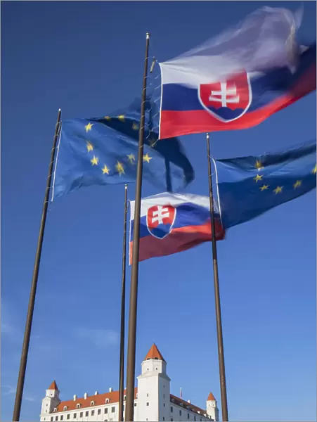 Slovakian and European Union flags of Parliament with Bratislava Castle, Bratislava