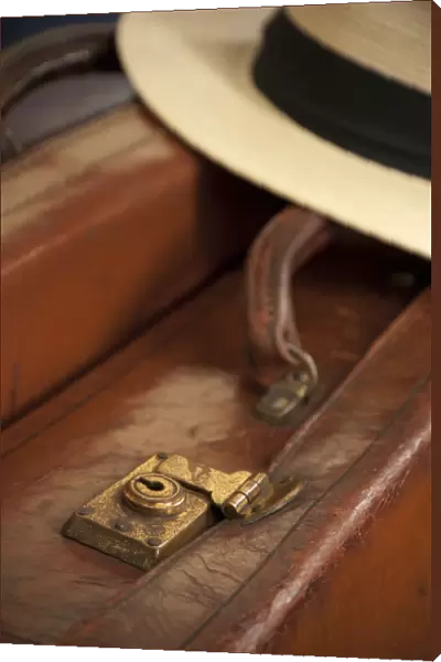 Vintage Leather Suitcase with Panama Hat