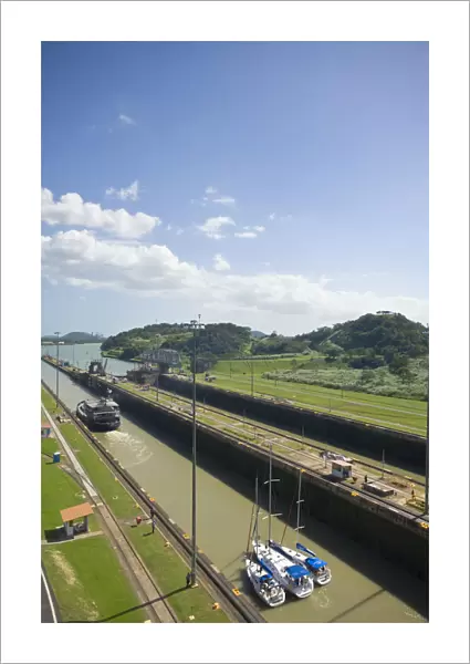 Panama, Panama Canal, Three Yachts tied up together in Miraflores Locks know as Tandam