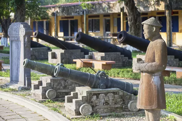 Statue and cannons at Fine Arts Museum, Citadel, Hue, Thua Thien-Hue, Vietnam
