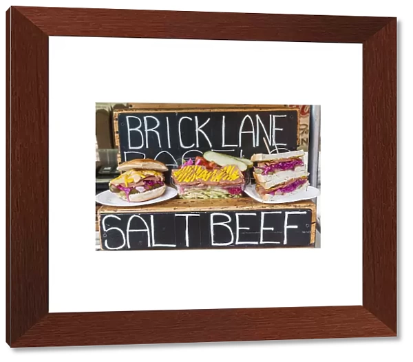 England, London, Shoreditch, Brick Lane, Street Food Stall Display of Salt Beef Sandwiches