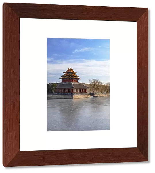 Tower and moat of Forbidden City at dusk, Beijing, China