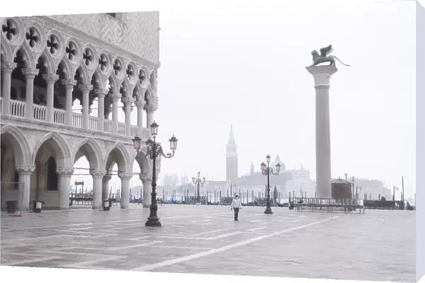 Foggy morning in Piazza San Marco with the San Giorgio Church appearing in the background