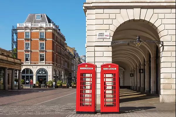 Red telephone boxes in Covent Garden, London, England
