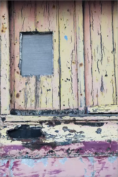 Paint peeling on a door in St Just, cornwall, UK