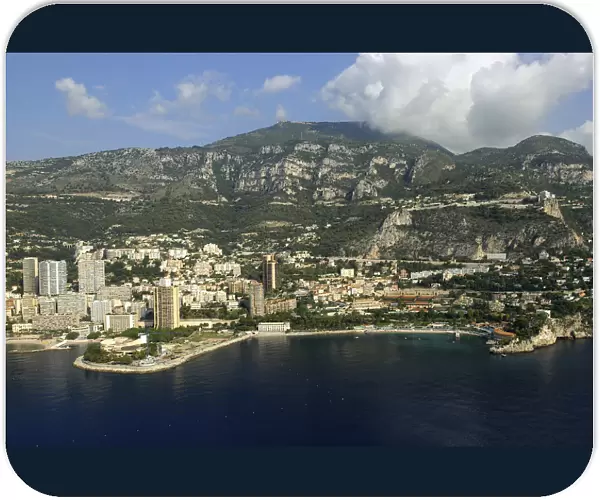 20038710. MONACO Cote d Azur Monte Carlo Aerial view from the sea toward the coastal city