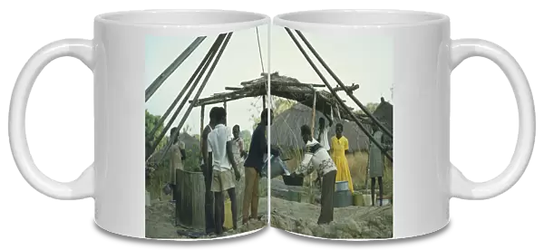 20070895. ETHIOPIA Work Collecting water at well sunk by International Voluntary Service