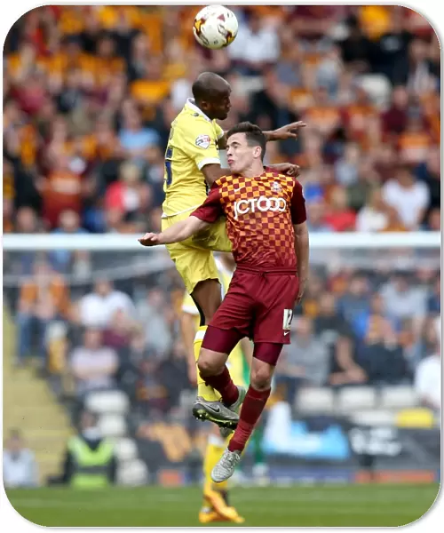 Millwall vs. Bradford City: Nadjim Abdou vs. Josh Cullen - Intense Aerial Battle in the 2015-16 Sky Bet League One Play-Offs