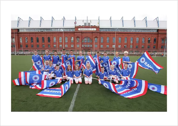 Rangers Football Club vs FBK Kaunas: Ibrox - Flag Bearers Guarding the Field in Champions League Second Qualifying Round (0-0)