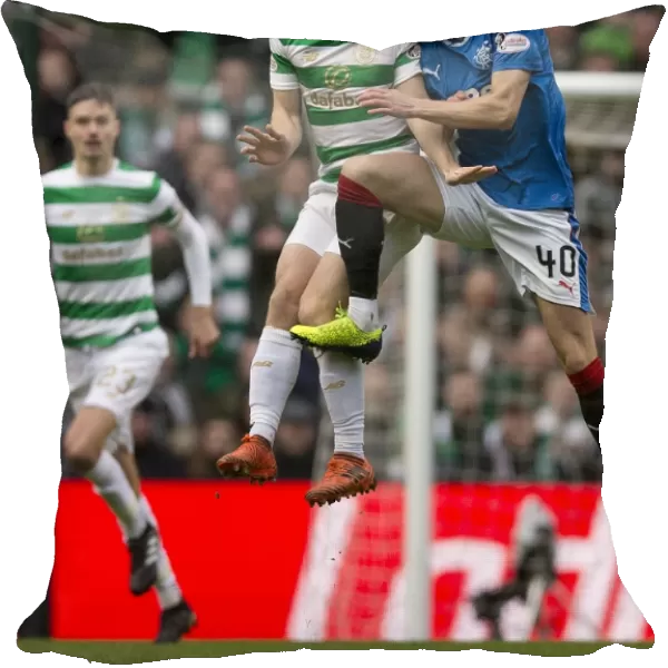 Ross McCrorie Soars Over James Forrest in the Intense Celtic vs Rangers Rivalry